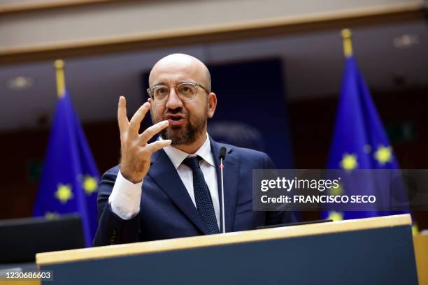 European Council President Charles Michel addresses European lawmakers during a plenary session on the inauguration of the new President of the...