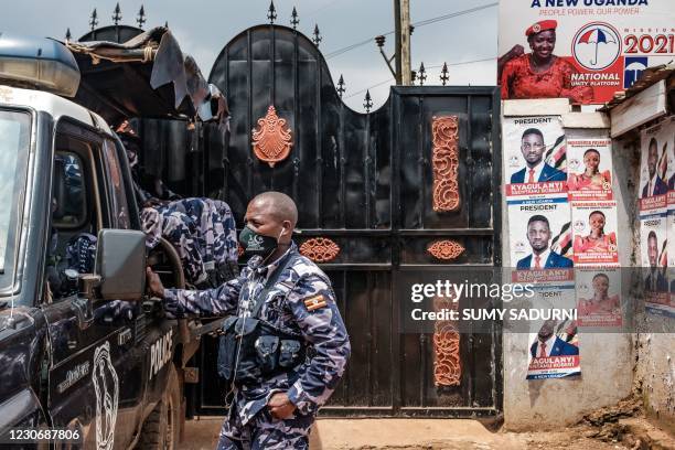 Patrol car of the Ugandan police is seen stationed outside the headquarters of the Uganda oppposition party National Unity Platform on January 20,...