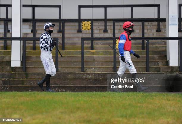 Jockeys make their way to the start of the Providers Of Man Power Silvershine Novices' Hurdle at Chepstow Racecourse on January 20, 2021 in Chepstow,...