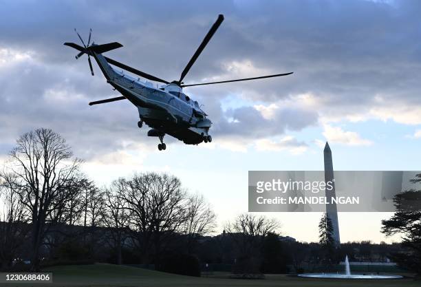 Marine One with US President Donald Trump and First Lady Melania Trump departs the White House in Washington, DC, on January 20, 2021. - President...