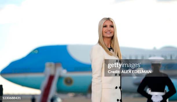 Ivanka Trump smiles as she arrives at Joint Base Andrews in Maryland for US President Donald Trump's departure on January 20, 2021. - President Trump...