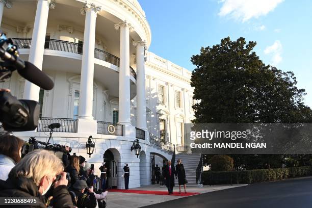 President Donald Trump and First Lady Melania Trump depart the White House in Washington, DC, on January 20, 2021. - President Trump travels to his...