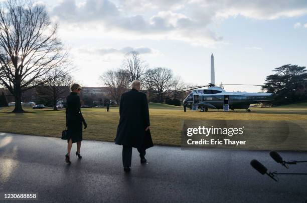 President Donald Trump and first lady Melania Trump prepare to depart the White House on Marine One on January 20, 2021 in Washington, DC. Trump is...