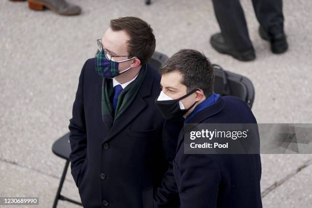 Former mayor of South Bend Pete Buttigieg arrives with his husband Chasten Buttigieg to the West Front of the U.S. Capitol during the 59th...