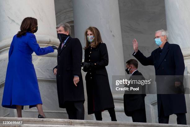 Vice President Kamala Harris, left, chats with United States Senator Roy Blunt , second from left, his wife Abigail Perlman Blunt, second from right,...