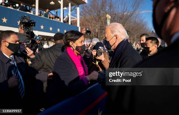 President Joe Biden talks with DC Mayor Muriel Bowser as he and and First Lady Dr. Jill Biden walk along Pennsylvania Avenue in front of the White...
