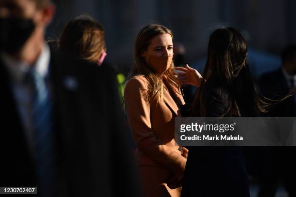 Natalie Biden, a granddaughter of U.S. President Joe Biden, walks with her family along the abbreviated parade route after Biden's inauguration on...