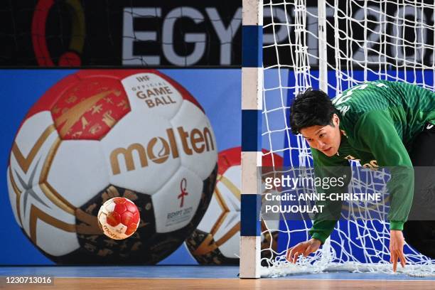 Japan's goalkeeper Takumi Nakamura eyes the ball during the 2021 World Men's Handball Championship match between Group II teams Japan and Argentina...