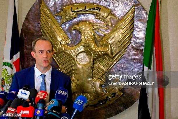 British Foreign Secretary Dominic Raab speaks during a joint press conference with Sudanese foreign minister at Khartoum airport on January 21, 2021....