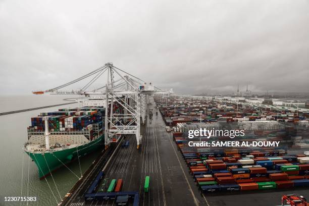 Picture shows the container ship "CMA CGM Jacques Saade" docks in the harbour of Le Havre, northwestern France, on January 21, 2021. - CMA CGM is...