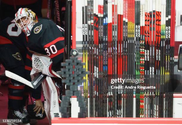 Matt Murray of the Ottawa Senators looks on before hitting the ice for warmup prior to a game against the Winnipeg Jets at Canadian Tire Centre on...