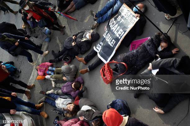 Die-in in front of the Social Security building. Culture workers and activists organized a performance in the streets of Toulouse to protest against...