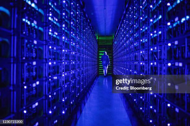 Mining rigs mine the Ethereum and Zilliqa cryptocurrencies at the Evobits crypto farm in Cluj-Napoca, Romania, on Wednesday, Jan. 22, 2021. The...