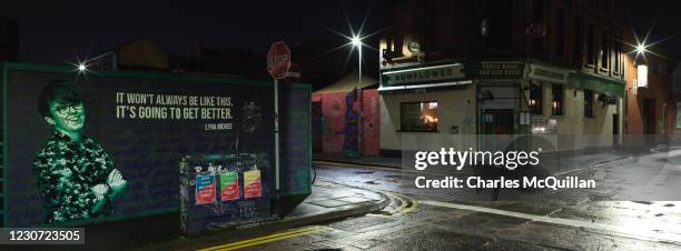 Panoramic view of The Sunflower pub and the empty surrounding streets on New Years Eve on December 31, 2020 in Belfast, Northern Ireland. One of the...