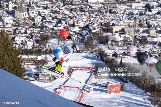 Urs Switzerland's Urs Kryenbuehl competes before his crash during the men's downhill event at the FIS Alpine Ski World Cup, also known as Hahnenkamm...
