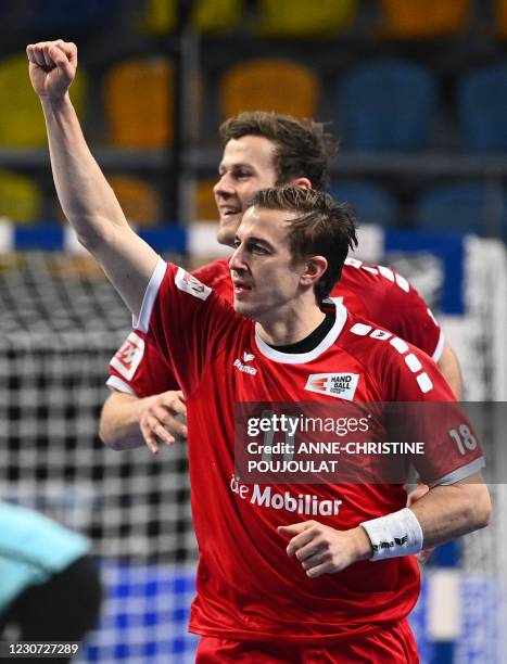 Switzerland's left back Roman Sidorowicz celebrates a goal during the 2021 World Men's Handball Championship between Group III teams Switzerland and...