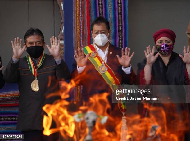 Bolivian President Luis Arce , Vice President David Choquehuanca and Minister of the Presidency María Nela Prada Tejada participate in the offering...