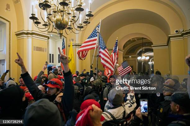 Supporters of US President Donald Trump protest inside the US Capitol on January 6 in Washington, DC. Demonstrators breeched security and entered the...