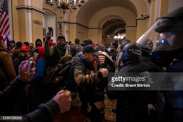 Supporters of US President Donald Trump protest inside the US Capitol on January 6 in Washington, DC. Demonstrators breeched security and entered the...