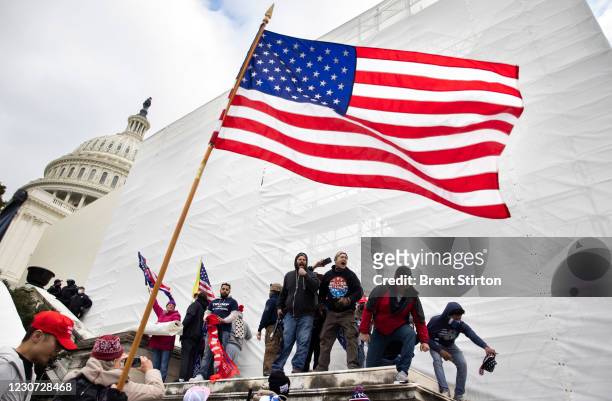 Trump supporters clash with police and security forces as people try to storm the US Capitol in Washington D.C on January 6, 2021. Demonstrators...