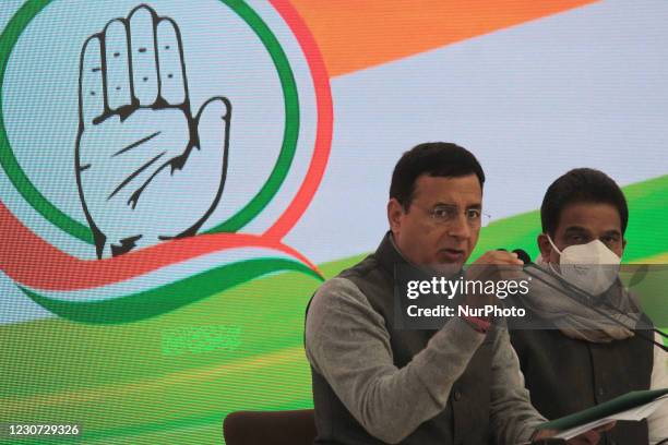 General Secretary, Randeep Singh Surjewala and K.C. Venugopal address media during a press conference after Congress Working Committee's meet to...