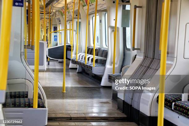 Interior view of empty Tube carriages. England remains under lockdown as the Prime Minster Boris Johnson refuses to rule out that it may continue...