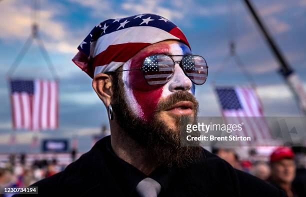 Jacob Anthony Angeli Chansley is seen at a Trump rally on January 4, 2021 in Dalton, Georgia. Chansley, known as the QAnon Shaman, attended the...