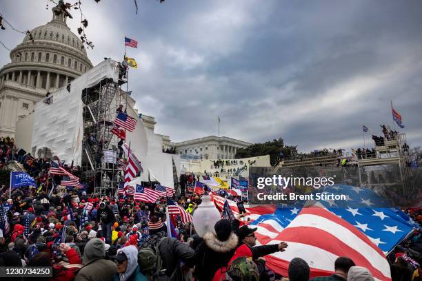 Trump supporters clash with police and security forces as people try to storm the US Capitol on January 6, 2021 in Washington, DC. Demonstrators...