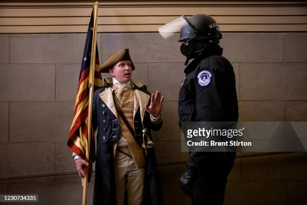 Protester dressed as George Washington debates with a Capitol Police before being pushed out. Supporters of US President Donald Trump protested...