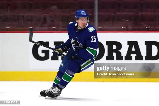 Vancouver Canucks Defenceman Brogan Rafferty on ice against the Montreal Canadiens during their NHL game at Rogers Arena on January 21, 2021 in...