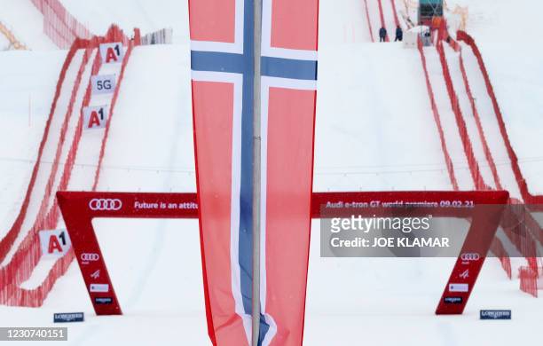 Norwegian flag is seen near the finish line of the downhill course of the FIS Men's Alpine Ski World Cup, also known as Hahnenkamm race, in...