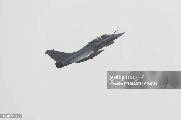 Indian Air Force Rafale fighter jet takes off during Ex Desert Knight-21, a bilateral air exercise between IAF and French Air and Space Force at Air...