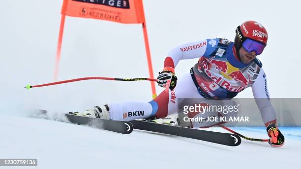 Switzerland's Beat Feuz competes during the men's downhill event at the FIS Alpine Ski World Cup, also known as Hahnenkamm race, in Kitzbuehel,...