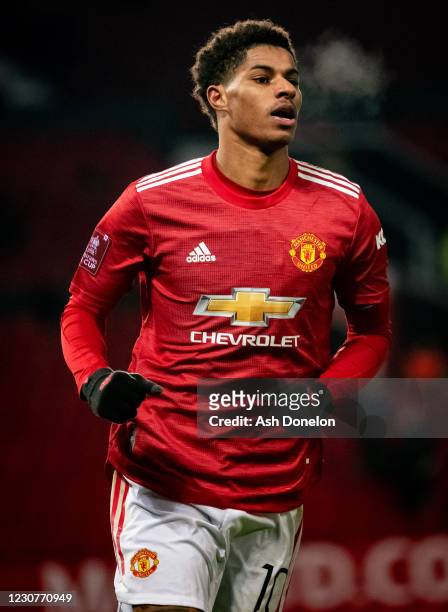 Marcus Rashford of Manchester United celebrates scoring a goal to make the score 2-1 during the Emirates FA Cup Fourth Round match between Manchester...