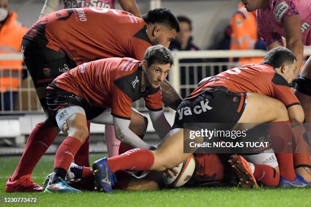 Toulon's French scrum-half Baptiste Serin prepares to grab the ball during the French Top14 rugby union match between RC Toulon and Stade Francais at...