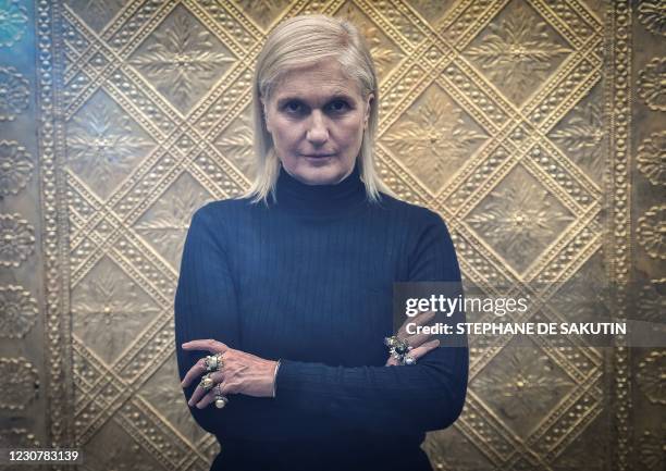 Christian Dior's Italian fashion designer Maria Grazia Chiuri poses during a fitting session at Christian Dior's Haute Couture fashion house in Paris...