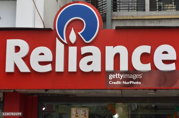 Reliance logo can be seen in Kolkata, India, 25 January, 2021. Reliance Industries' profit jumped in the final quarter of 2020 as it reined in...