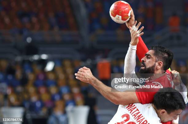 Ali Merza of Bahrain in action during the 27th IHF Men's World Championship Group II match between Bahrain and Japan at Cairo Stadium Sports Hall in...