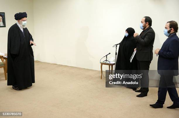 Iranian Supreme Leader Ayatollah Ali Khamanei meets with the family members of Iran's top nuclear scientist Mohsen Fakhrizadeh who was assassinated...