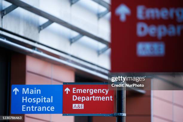 Signs point to the emergency department of the Royal London Hospital in London, England, on January 25, 2021. Across the UK, deaths recorded within...