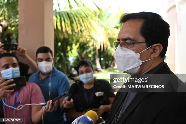 The Archbishop of San Salvador, Monsignor Jose Luis Escobar Alas, speaks to the press upon arriving at the headquarters of the Archbishop of San...