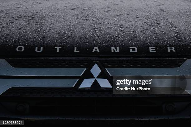 Mitsubishi logo seen on a parked Mitsubishi Outlander car in Dublin city center. On Monday, January 25 in Dublin, Ireland.