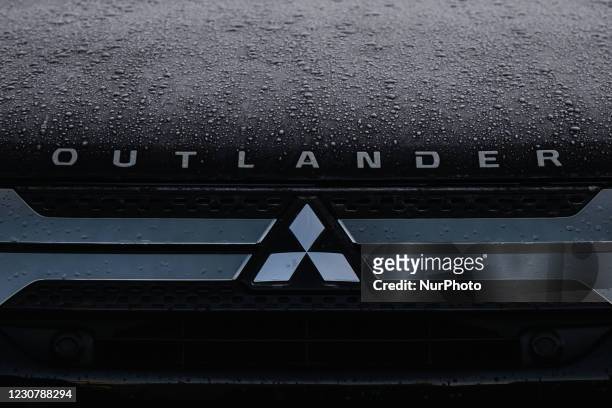 Mitsubishi logo seen on a parked Mitsubishi Outlander car in Dublin city center. On Monday, January 25 in Dublin, Ireland.