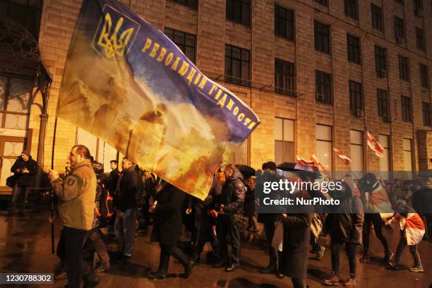Ukrainians attend a tribute march for the Maidan activists or &quot;Heroes of the Heavenly Hundred&quot;, honoring the anniversary of the first...