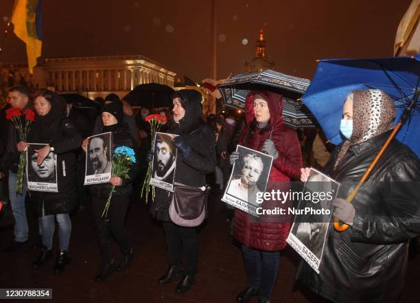 Ukrainians carry portraits of the Maidan activists or &quot;Heroes of the Heavenly Hundred&quot;, honoring the anniversary of the first fallen Maidan...