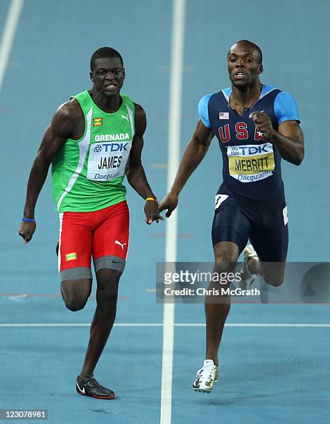 Kirani James of Grenada and LaShawn Merritt of United State compete in the men's 400 metres final during day four of the 13th IAAF World Athletics...
