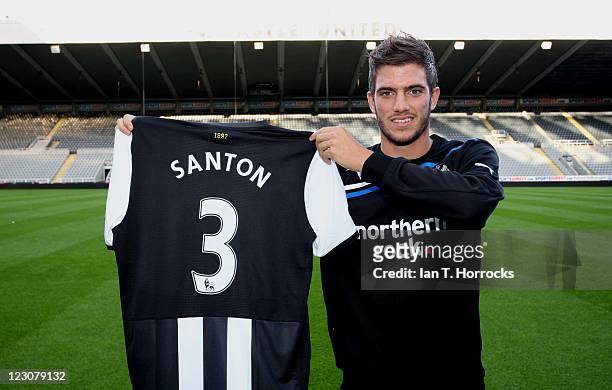 Davide Santon poses after signing for Newcastle United from Inter Milan at St James' Park on August 30, 2011 in Newcastle, United Kingdom.