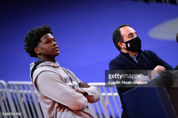 January 25: Minnesota Timberwolves President of Basketball Operations Gersson Rosas talks with Anthony Edwards before the game against the Golden...