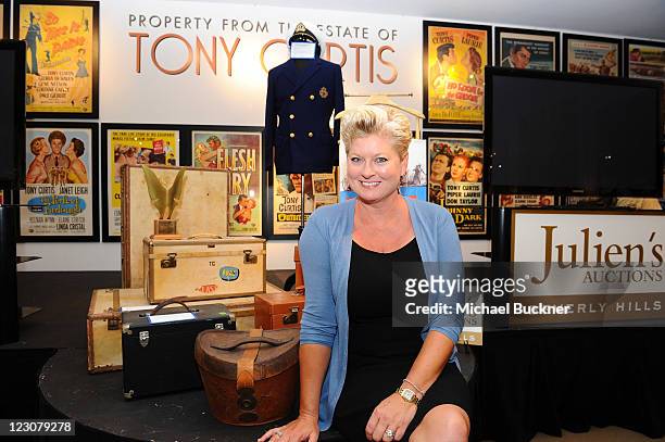 Jill Curtis poses during the press preview of the late Tony Curtis' art, antiques, entertainment memorabilia at Julien's Auctions Gallery on August...