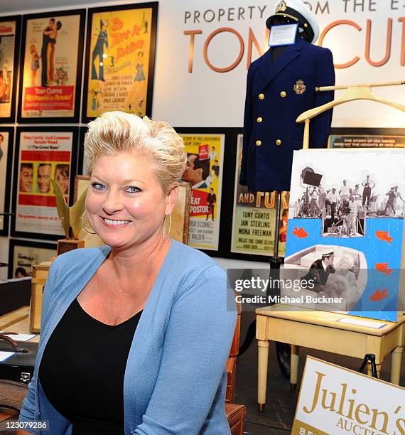 Jill Curtis poses during the press preview of the late Tony Curtis' art, antiques, entertainment memorabilia at Julien's Auctions Gallery on August...